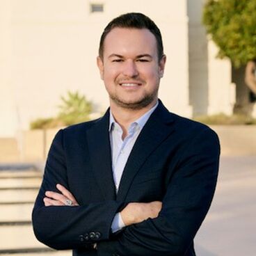 2026 City Council Candidate Daniel Ivanov headshot outdoors