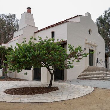 Front and side view of the Miles Memorial Playhouse in Reed Park