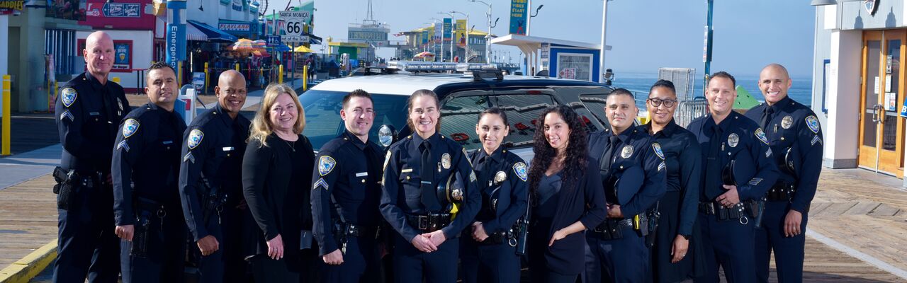 Desktop Header Group Photo Of Uniformed Sworn And Civilian Staff From The Community Affairs Unit In SMDP On The Pier 