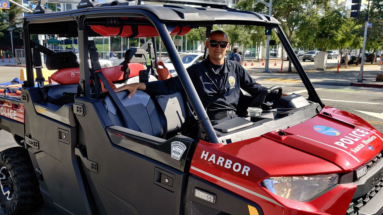 Harbor Rescue Vehicle and Officer at the Beach