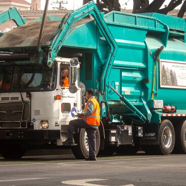 City of Santa Monica Garbage Truck Driver Talking to another Public Works Employee in the City Yards
