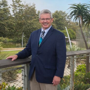 City Attorney Doug Sloan Posing in a Suit at Tongva Park