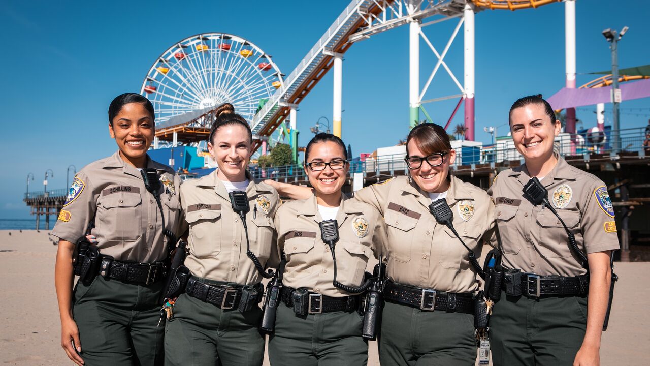 Female Police Employees Group Pose on the Beach in front of the Santa Monica Pier