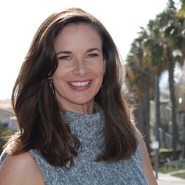 Election 2020 Rent Control Candidate Anastasia Foster outdoors with palm trees in background