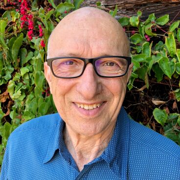 Election 2020 Council Candidate Mario Fonda-Bonardi with green hedge in background